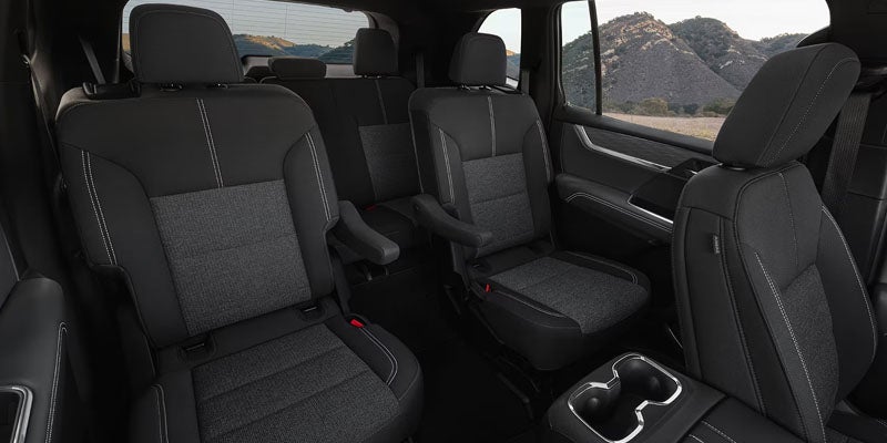 Spacious three-row interior of the 2026 GMC Acadia with premium seating