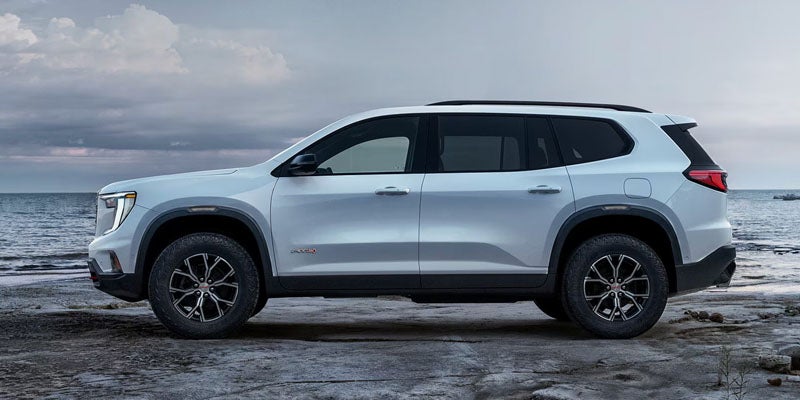 Side profile of the 2026 GMC Acadia midsize SUV available in Paris, TN