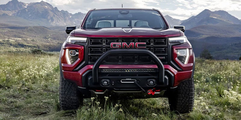 2026 GMC Canyon midsize pickup truck showcasing rugged front-end styling and off-road capability