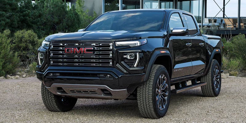 2026 GMC Canyon midsize pickup truck featuring premium exterior styling and signature GMC grille