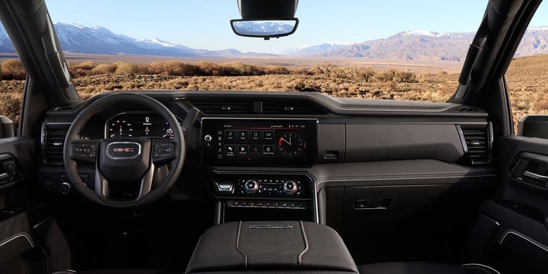 Driver's view of the 2026 GMC Sierra 2500 HD SLT cabin with advanced safety technology