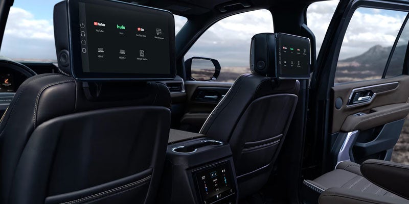 Premium interior of the 2026 GMC Yukon featuring rear entertainment screens and leather seating